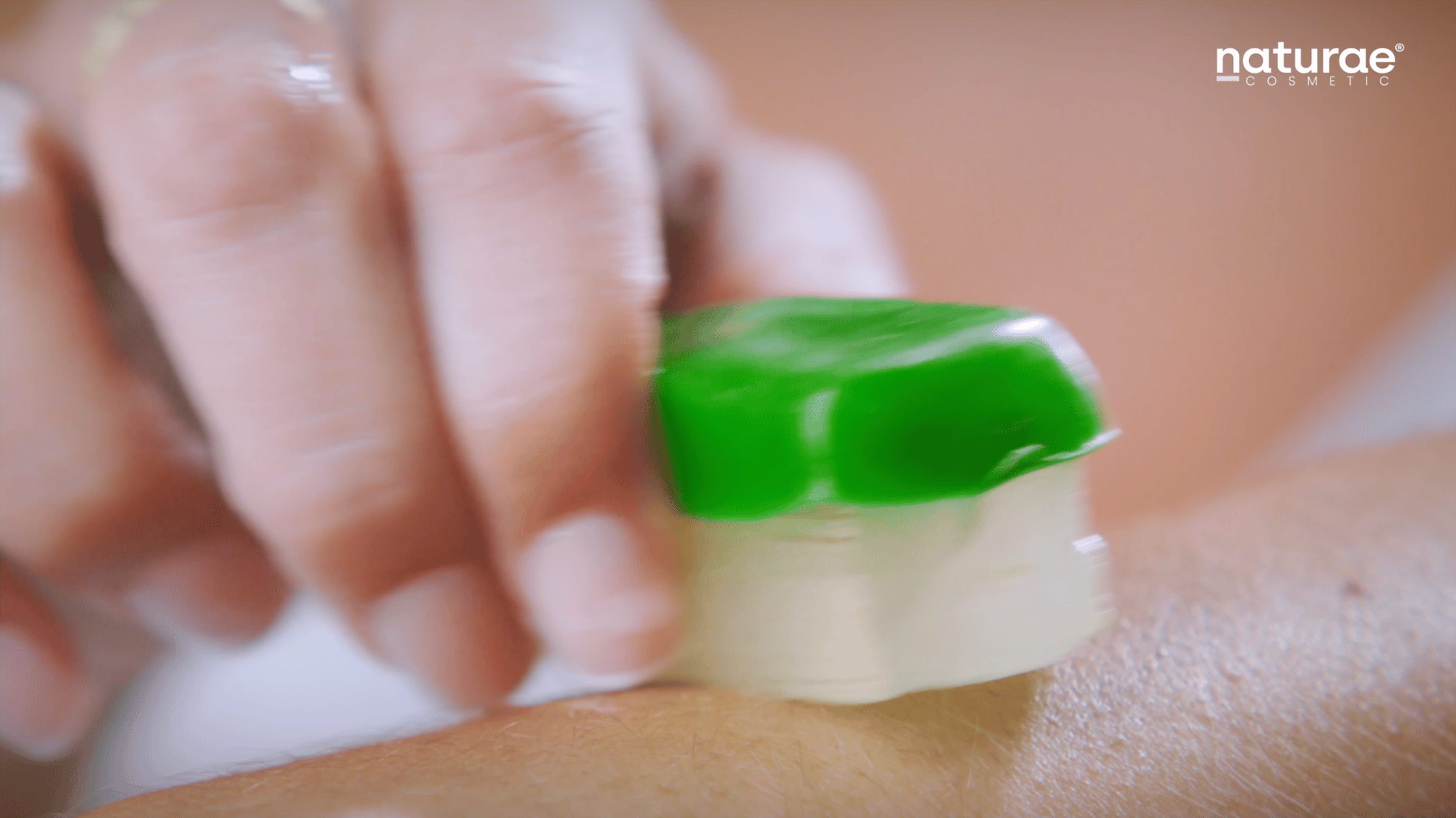 Naturae Cosmetic skincare product applied on skin in editorial film by Spaziale Studio